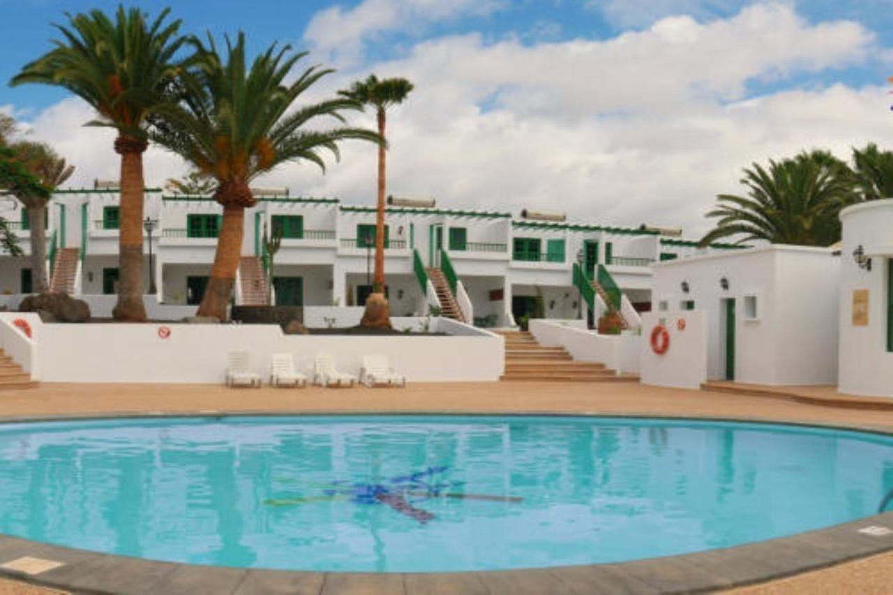 Apartamentos Tropicana بويرتو ذيل كارمين المظهر الخارجي الصورة